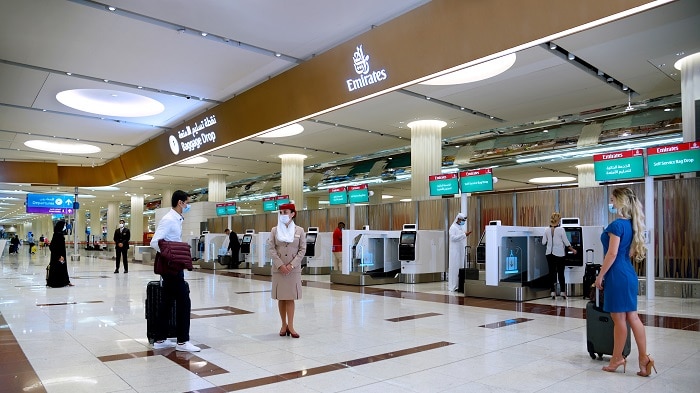 emirates laptop checked baggage